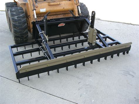 dirt rake skid steer|skid loader rake attachments.